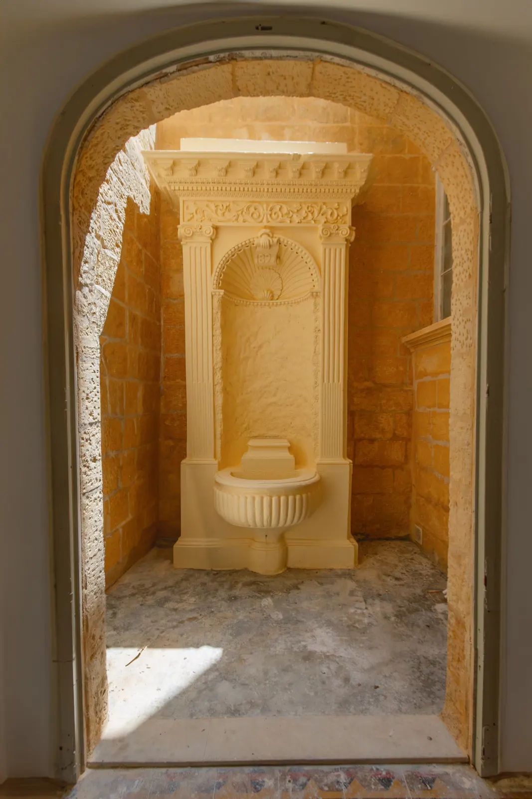 Carved limestone niche in the entrance