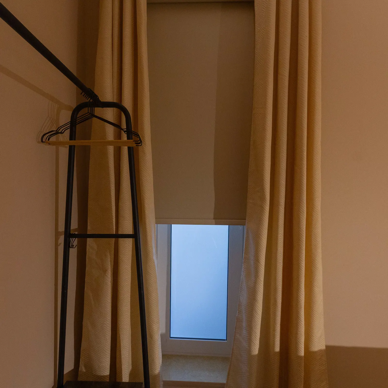 Hanging rail beside the curtains